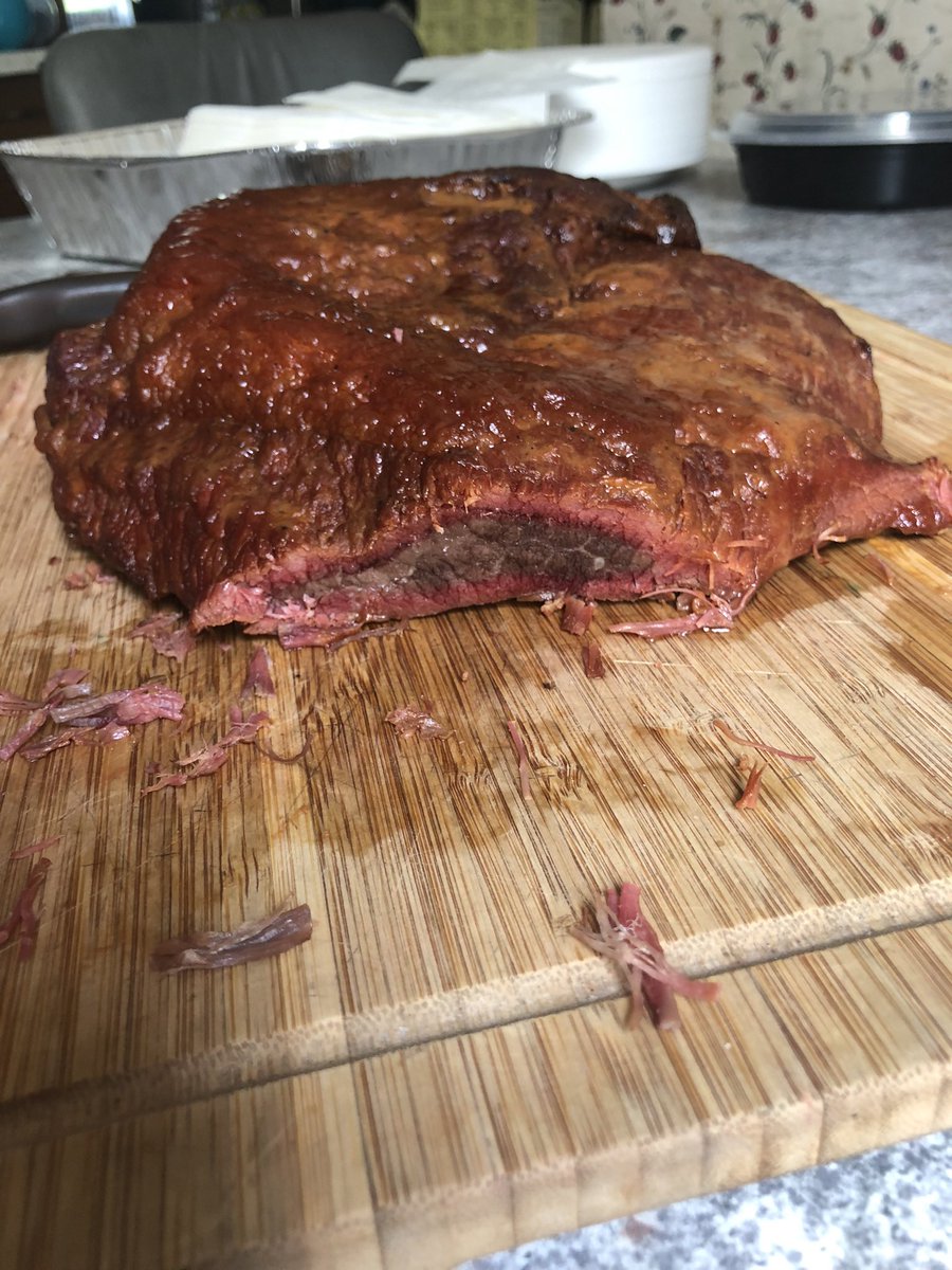 pjn316's tweet photo. This what a grey corned beef looks like smoked for 7 hours at 180 to 220 degrees last hour wrapped in tin with apple juice. Because it’s grey when you start it looks dark when it’s done. https://t.co/m3Zd5RwNUX
