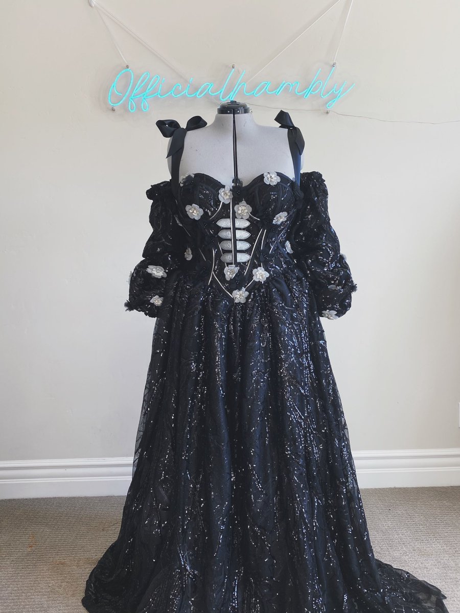 Cat is out of the bag! I have partnered with Netflix to offer a one of a kind giveaway for prom! This size 26/28 gown inspired by the Darkling from Shadow and Bones has lace up back w/modesty panel, puffy sleeves, and is completely silk lined! Enter here:  https://vm.tiktok.com/ZMeQgdK83/ 