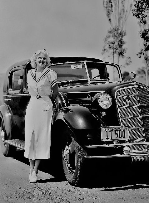 And on the topic of blonde bombshells, here's the OG blonde bombshell Jean Harlow and her stately 1934 Cadillac V12 Town Car.