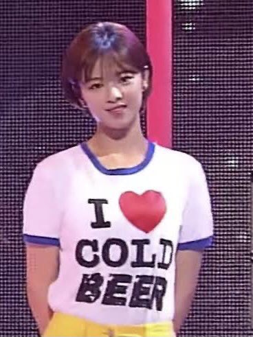more of twice's questionable fashion choices (tzuyu's shirt says "hoes take off your clothes")