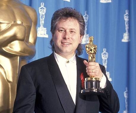 Get back up there Menken! Or are you too busy working on Aladdin coming out later this year?? My kids won't stop asking me to go see it. Haha they won't stop. I'm so tired, Alan #1992Oscars