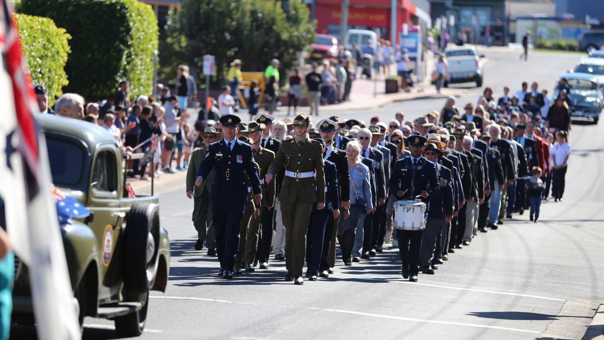 HugoMcMeekin's tweet photo. It was a privilege to participate in #AnzacDay services in Merimbula and Pambula with colleagues from ADFA. Many thanks to @merimbularsl for your hospitality. Picture from Merimbula News Weekly. @ComdtADFA https://t.co/6v7AGiSVV7