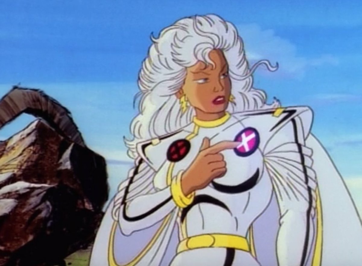 Ororo: How you got Sam Wilson in a Captain America suit with "made in Wakanda" on it. Bay-baaaay, that is not the lewk. Shuri: I-I ... Ayo made me do it! Lemme get her on the phone. Also, Again I JUST did the wings. The suit is from what do, yall call it? "Party City"?