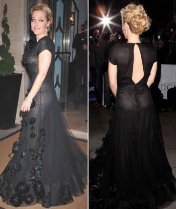 She looks hot in black as well: