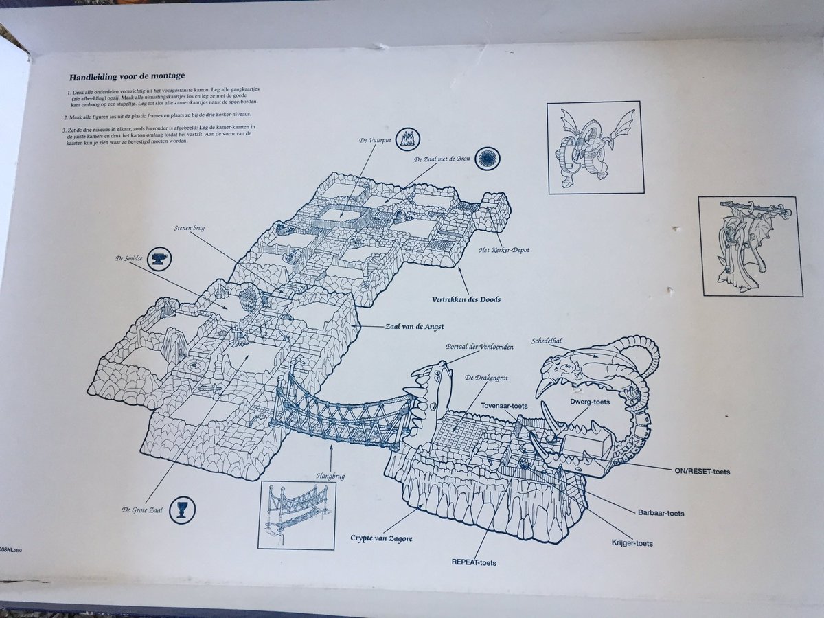 In classic prop game fashion the inside of the cover is also an assembly manual. Zagor has you building a stone rock and a bridge. Lots of plastic.