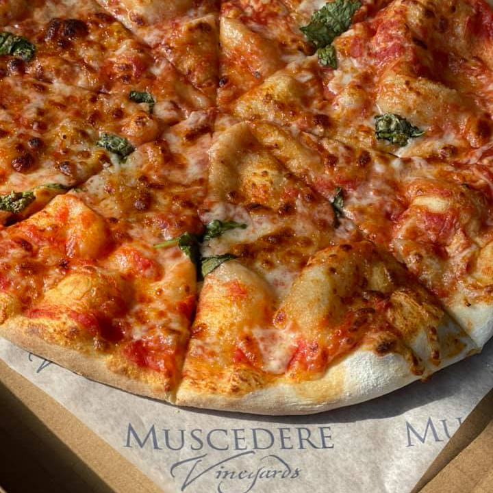 Wood-fired pizza for takeout? You can now order <a href="/MuscedereWine/">Muscedere Vineyards</a> wood-fired pizza for takeout every Fri. &amp; Sat. from 4-6pm. Simple online ordering process where you can select from 5 different pizzas, cooked or partially cooked and of course the option to add your favourite wine.