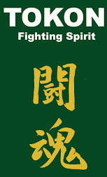 The wrestling promotion in the episode is "Tokon Woman Pro Wrestling" - this is not a real promotion, but the word Tokon is synonymous with the concept of "Fighting Spirit".