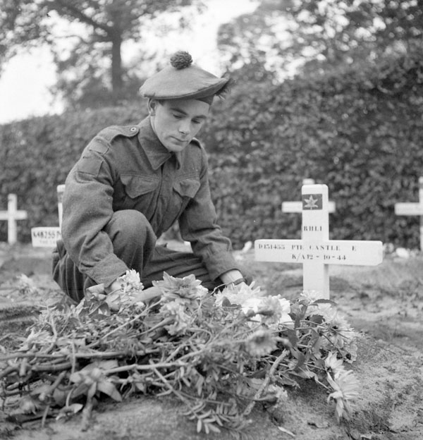 Private E. Castle of The Black Watch (Royal Highland Regiment) of Canada at the grave of his brother, who was a member of The Royal Hamilton Light Infantry. Ossendrecht, Netherlands, 26 October 1944.

amzn.to/3nyk2SR