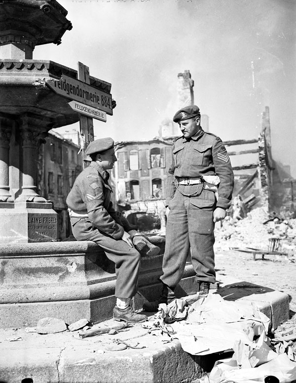 Corporal M.W. Musgrove and Sergeant E.O. Hanna, both of the Canadian Provost Corps, Falaise, France, 17 August 1944.

amzn.to/3xqPXsH
