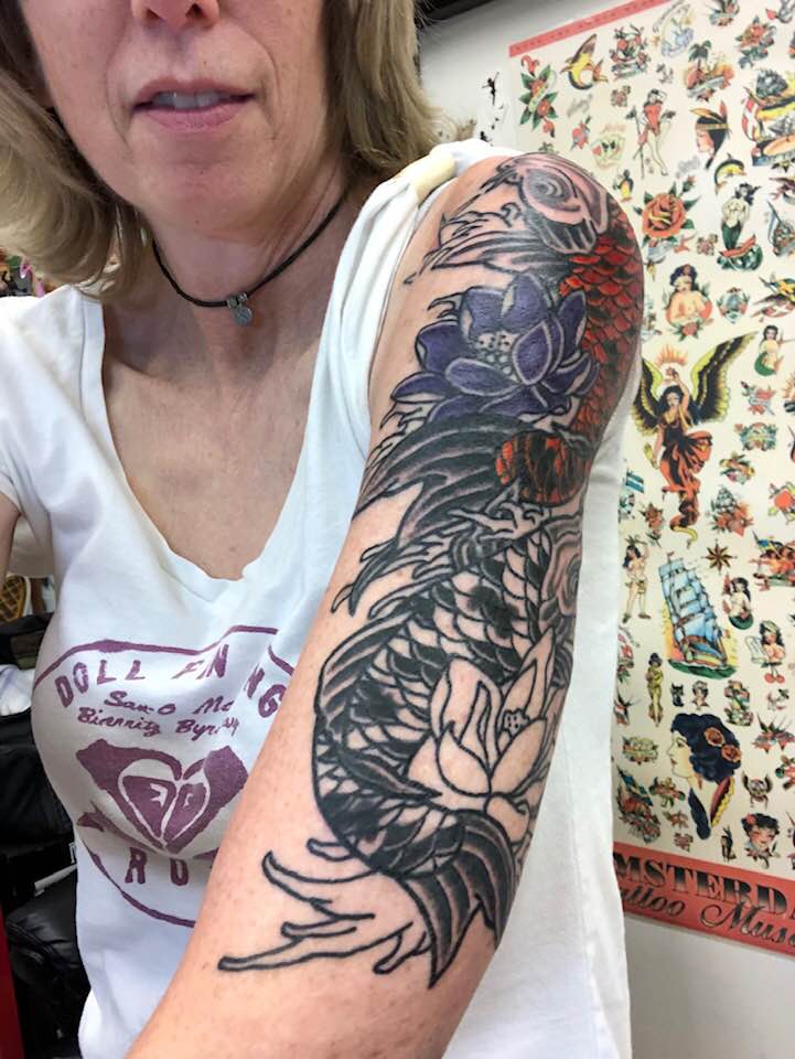 This has been by far my biggest tattoo project. It took 4 sittings over the course of two months to complete. I spent a total of 12.5 hours in the chair! My friend Steph at Electric Chair Tattoo did a phenomenal job.Also this is also a cover-up of tat #7 as you'll see in photo.