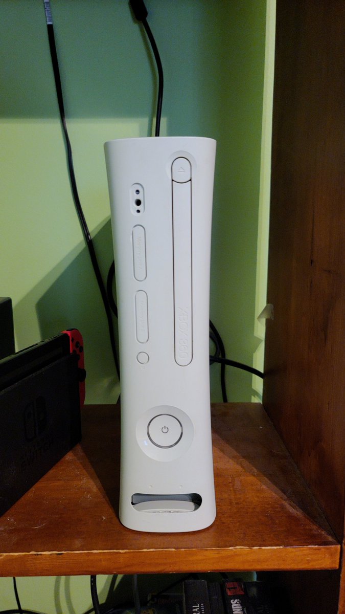 Got my Girlfriends xbox 360 running beautifully now. Once I get my Back compat PS3 up and running there will be cable management being done on our bedroom shelf.