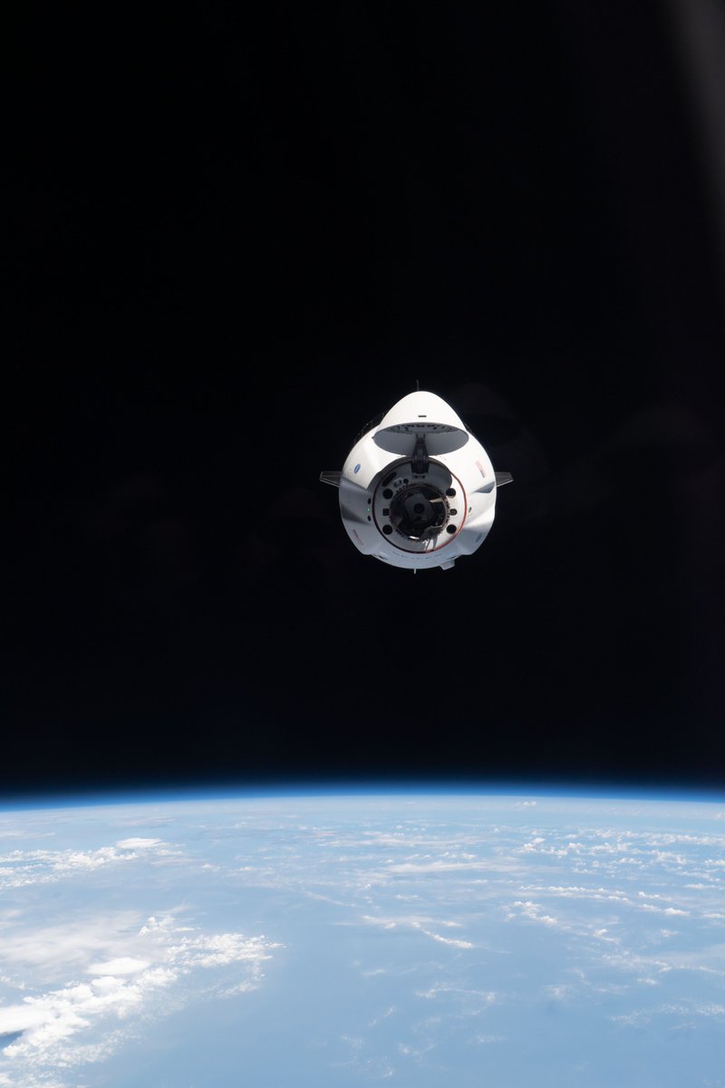 Space_Station's tweet photo. The @SpaceX #CrewDragon Endeavour with four astronauts approaches the station less than one day after launching from @NASAKennedy. More pix... https://t.co/LqHZaG3ny4 https://t.co/lGrX526QSl