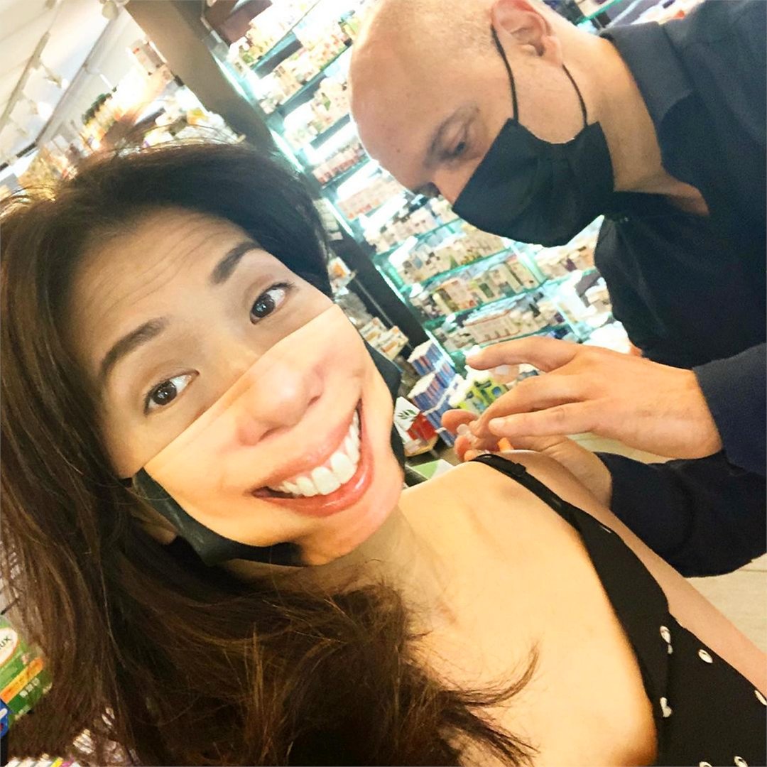 MakeVancouver's tweet photo. No mask can hide @sophielui's excitement as she joins the #vaccinated club! 🙌 Have you tried making a #selfiemask yet? We hear Mom's like them. If only there was a special occasion coming up on May 9th where we could surprise her with one... 💭HINT 👉 https://t.co/rmKgS09yqx https://t.co/eqDwPfGzK3