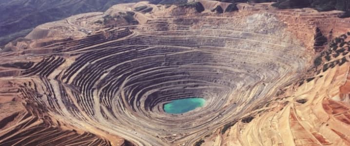 gjs_soc's tweet photo. The movement towards electric vehicles has been a large topic of discussion recently.  However most people fail to realize how environmentally harmful EV's are.  Here is a photo of a lithium mine for EV batteries vs an oil derek.  #LVCPops https://t.co/0GBSsaCicg