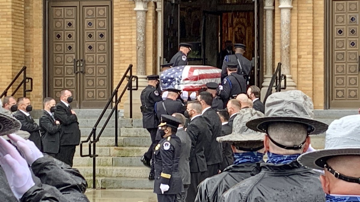 The  casket of  slain U.S Capitol Police Officer William "Billy" Evans is brought into church for his funeral in Adams, Ma.