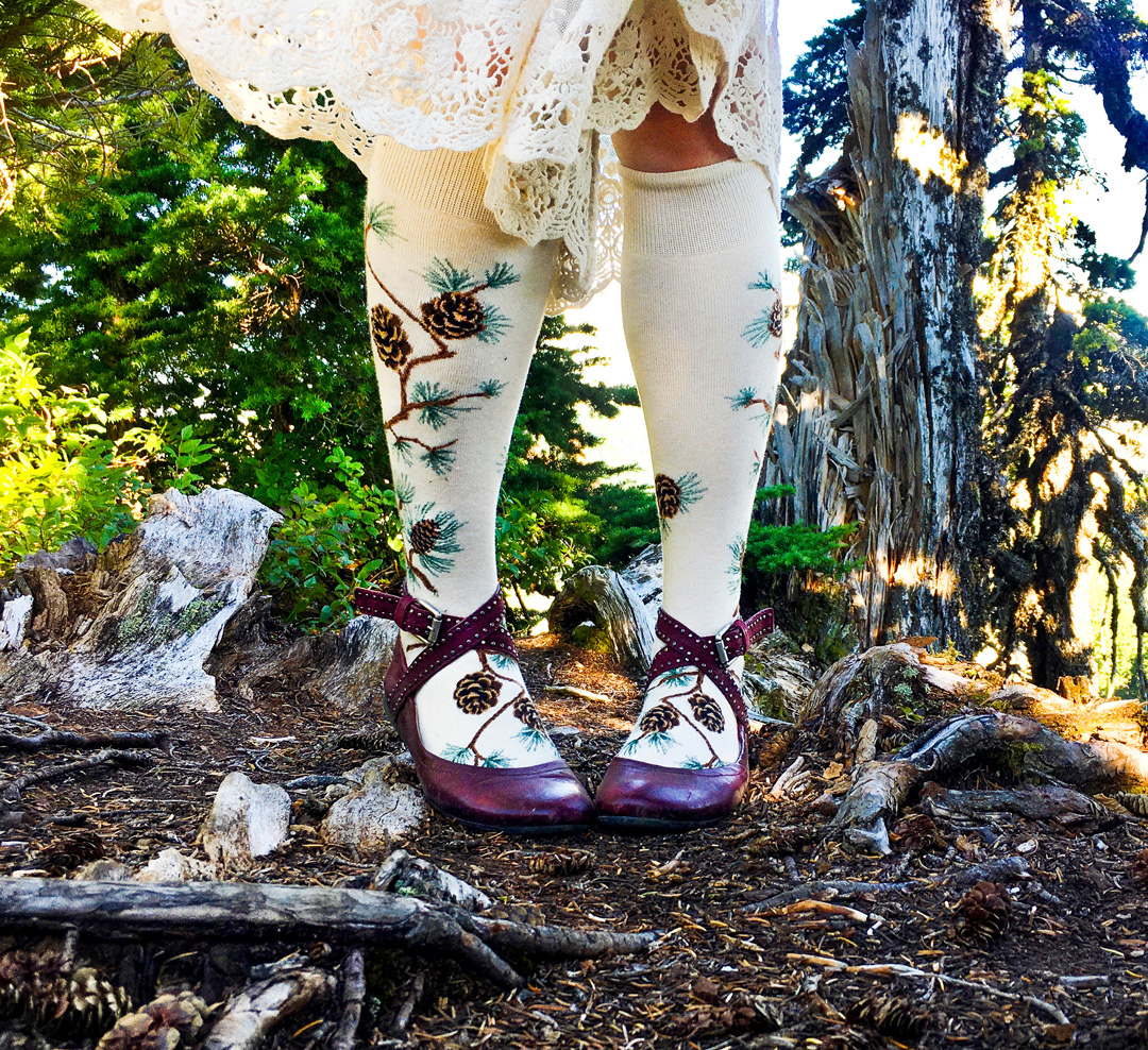 Explore your surroundings in these fun pinecone socks. You never know what you'll see when you step outside! #takeahike