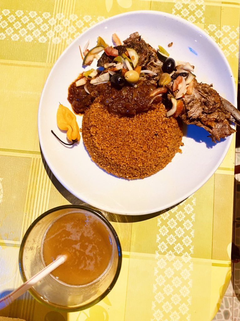 Local guide took us to a place where I tried red wolof rice, white wolof, lamb, beef, chicken, Bisaap (zobo), tamarind & baobab drinks.Loved all of it. Won’t pick it over my Nigerian Jollof yet but enjoyed it.P.S: image of red wolof, lamb & tamarind.
