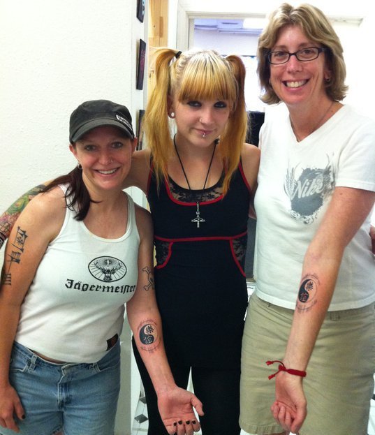 I don't remember the name of the tattoo shop in San Antonio but I do remember the artist being super young. Maybe 21? It was a friend of a friend. Regardless, Tish and I were thrilled to have a special one-of-a-kind tat together.