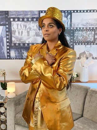 Lilly in this all gold suit is absolutely everything