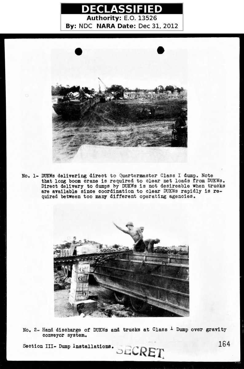 Vehicles which were planned to have been moving supplies from ships to the beach and from the beach to inland depots.  As these vehicles moved troops farther away from Haguchi beach, supplies slowly built up on the beach to the point it was obstructing traffic off the beach.54/