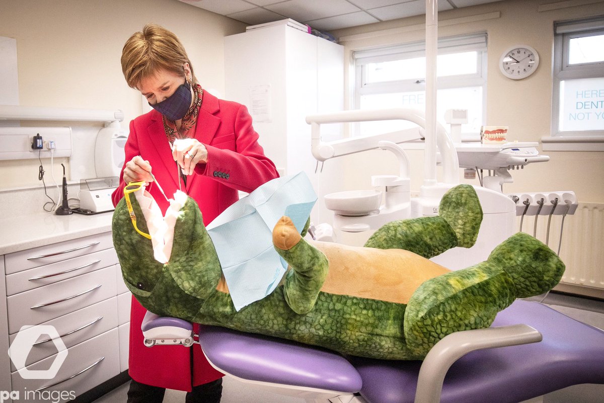 Jane Barlow on Twitter: "Scotland's First Minister @NicolaSturgeon, leader  of the Scottish National Party @snp, checks the teeth of "Dentosaurus"  during a visit to the Thornliebank Dental Care centre in Glasgow during