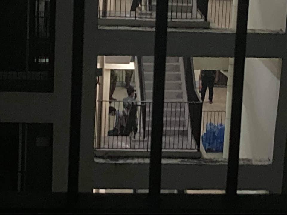 HAPPENING NOW :At Seikkan Township, Yadanar Garden Housing, SAC forces raided and arrested unidentified man who was seem sitting on knees. Source : <a href="/soezeya/">soe zeya tun</a> #WhatsHappeningInMyanmar #Apr16Coup