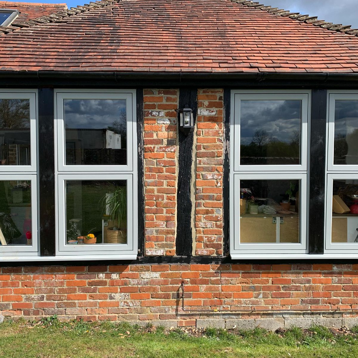 Check out this beautiful 'Choices' Alternative to Timber installation by <a href="/premhomeimp/">Premier Home Improve</a>. The Painswick Grey R7 <a href="/residence9/">Residence Collection</a> flush casement windows and doors, finished with black hardware, perfectly compliments this period barn property. <a href="/CWGChoices/">CWG Choices Ltd</a>