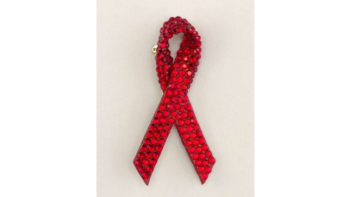 @amhistorymuseum @NMNH @NationalZoo @PostalMuseum @NMAAHC @smithsoniannpg The red ribbon was created in 1991 by artists from the organization Visual AIDS. It's become an internationally recognized symbol for HIV and AIDS awareness, support, and remembrance for those who have died. James Arpad designed this pin, ca. 1992, in our @cooperhewitt.