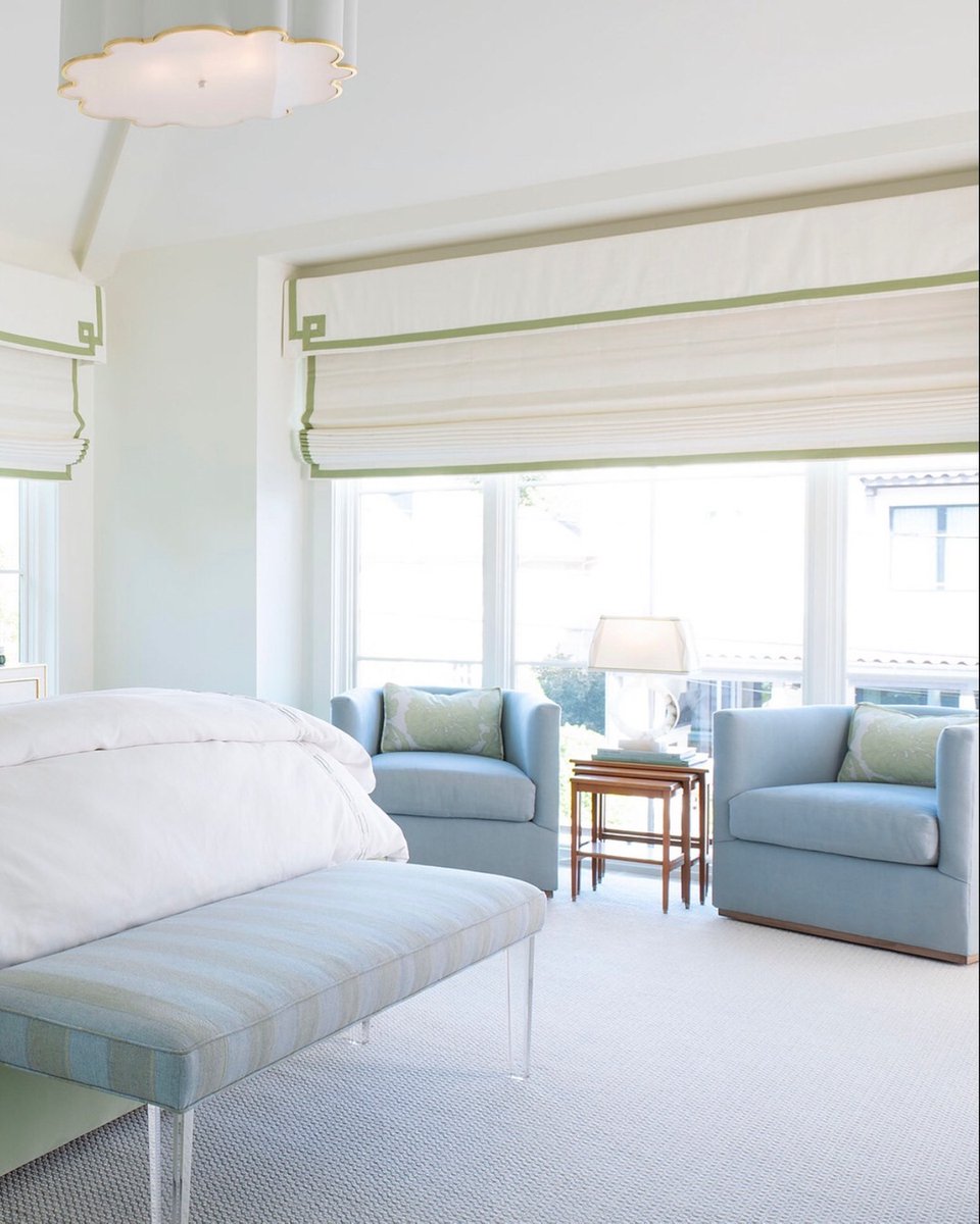 A beautiful balance of color and calm in a bedroom designed by Dallas-based Amy's Interiors (bit.ly/3myjqw0). Trimming window treatments: Flanders Border in Honeydew: bit.ly/3d28W4B
Photo: Piassick Photography