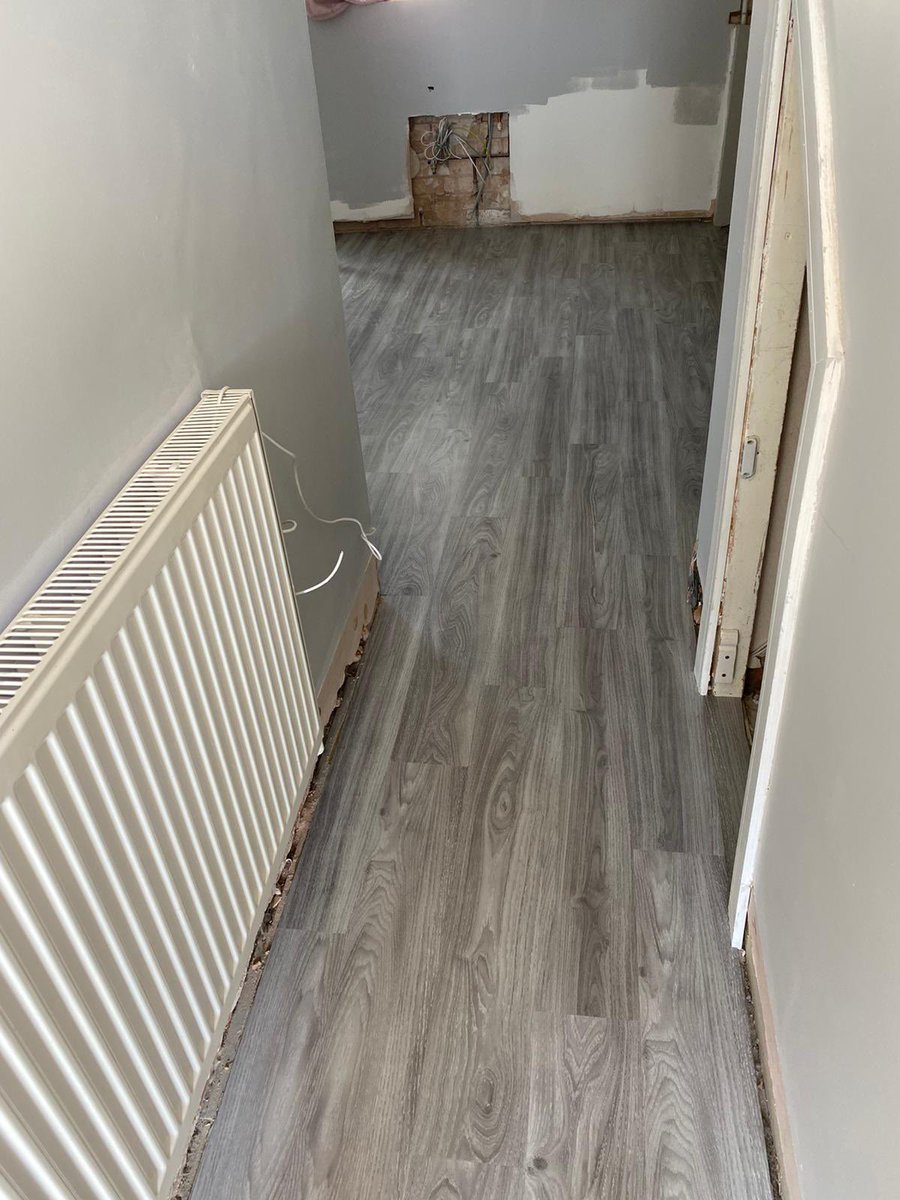 Stunning luxury vinyl planks in colour grey ash supplied and fitted to a kitchen and conservatory - nice and bright, looks amazing! Call 01244 291900 for a free quotation #chestertweets #luxuryvinylspecialists