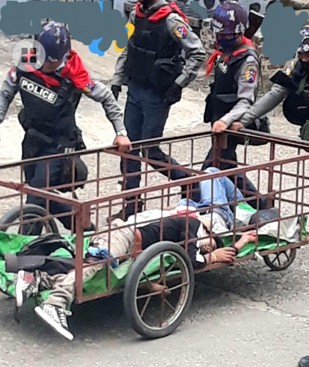 summersnow776's tweet photo. In the afternoon, members of the Terrorist Council stormed the peaceful town of Mogok. At that time, two civilians were shot dead. Terrorists also carried the two civilians who had been shot. 
Rest in peace, both innocent people. 

NUG ASSEMBLE
#Apr17Coup
#WhatsHappeningInMyanmar https://t.co/01NJYLmD5W