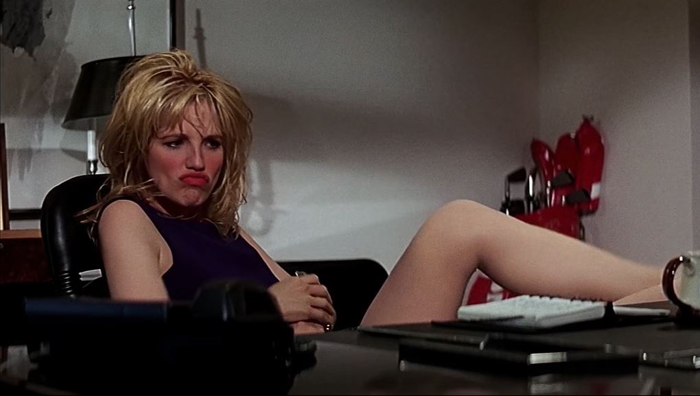 Ellen Barkin, playing a misogynist bozo reincarnated in the body of Ellen B...