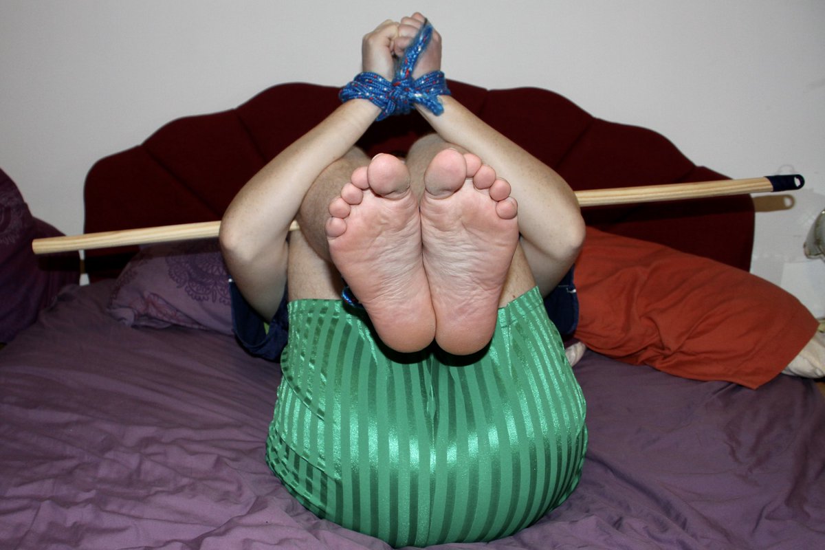 BondageNW's tweet photo. And that same Ginger lad from my previous tweet was also tied up on a bed in this position wearing a nice green footy kit but his feet bare..perfect for tickling 😜 https://t.co/CotLHqi4sl