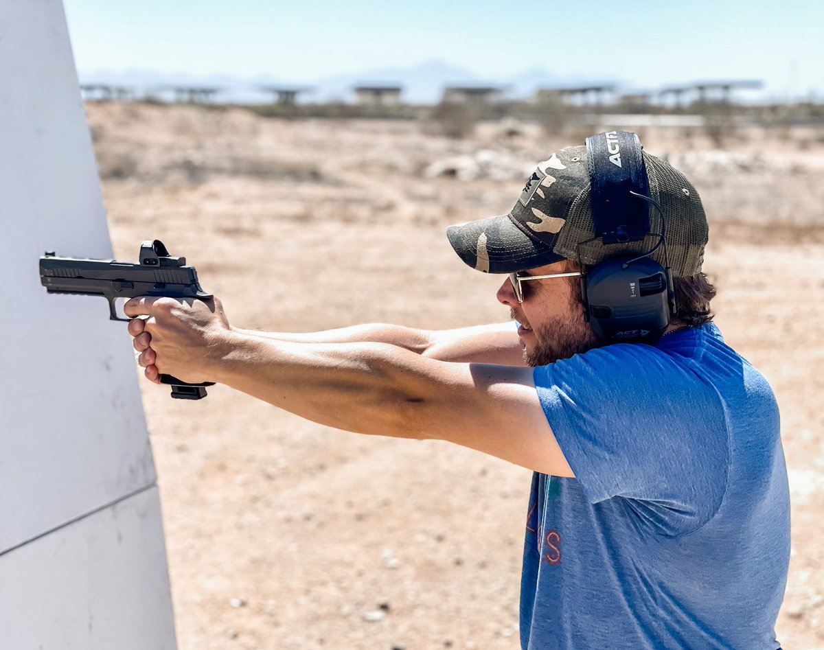 EliCrane_CEO's tweet photo. Had a great time working with the talented creator and artist @BrettRSmith76 with some firearms training recently. I got a new friend and a couple great books in the process. #sigsauer #x5legion https://t.co/T7A6WgZVeT