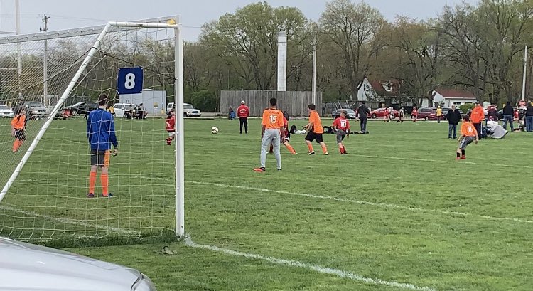 My boy protected the goal today.  Shutout for his team, I think the final score was 7-0! ⚽️🧡⚽️ #keepermom