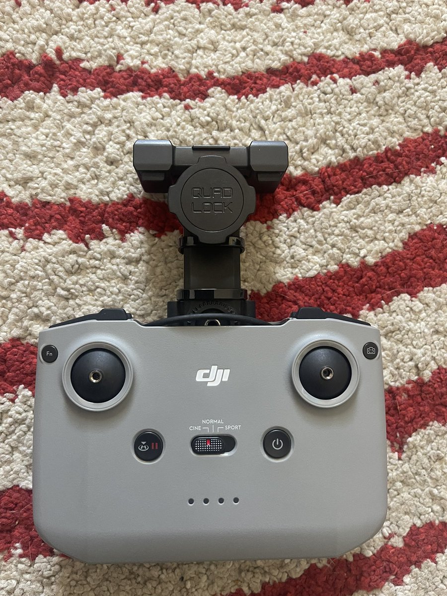 tomborowski's tweet photo. @QuadLockCase Would you have a better solution to mounting my phone in QuadLock case to a DJi drone remote? The case is too thick to fit in the expandable holder in the remote. I had a spare part and jigged this but perhaps there is a better way to mount it? Thanks https://t.co/QvMqpDGnk6
