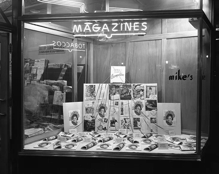 Apr17, 1947 • Mike's News Stand Photo taken OTD showing Mike's front window display. The most popular ticket vendor at the time was located at 10062-Jasper Avenue (present-day Scotia Place). It operated from here for over 60 years. 📌#EdmontonWhenAndWhere 📷 • EA-600-21a