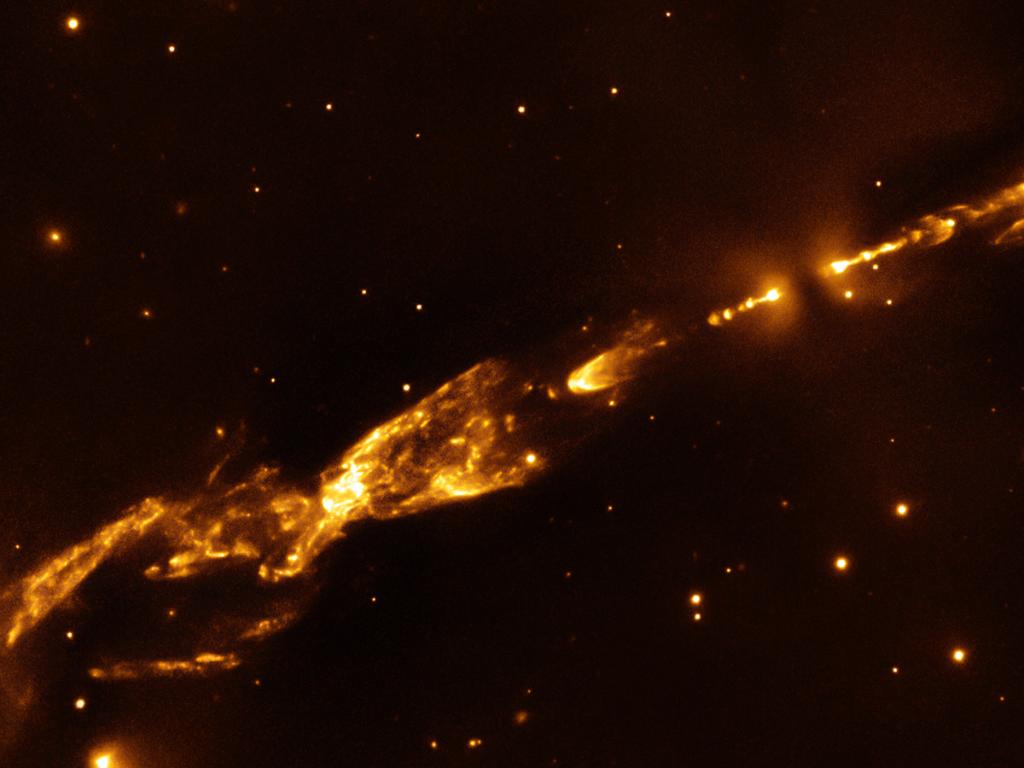 Herbig-Haro (HH) 212 is located about 1,400 light-years away in the constellation Orion. At the center of HH 212 resides a still-forming star or protostar that will eventually grow to become about the mass of our Sun. Jets from the protostar extend across about 5 light-years of space.