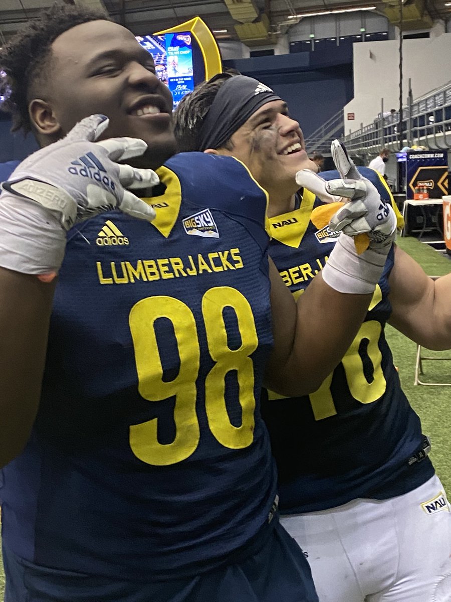 KevinMcCabe987's tweet photo. All smiles! Former Mtn Ridge star @tommyellis10_ and Sheldon Newton after @NAU_Football 19-9 win over @VandalFootball https://t.co/NFqWioN1y8