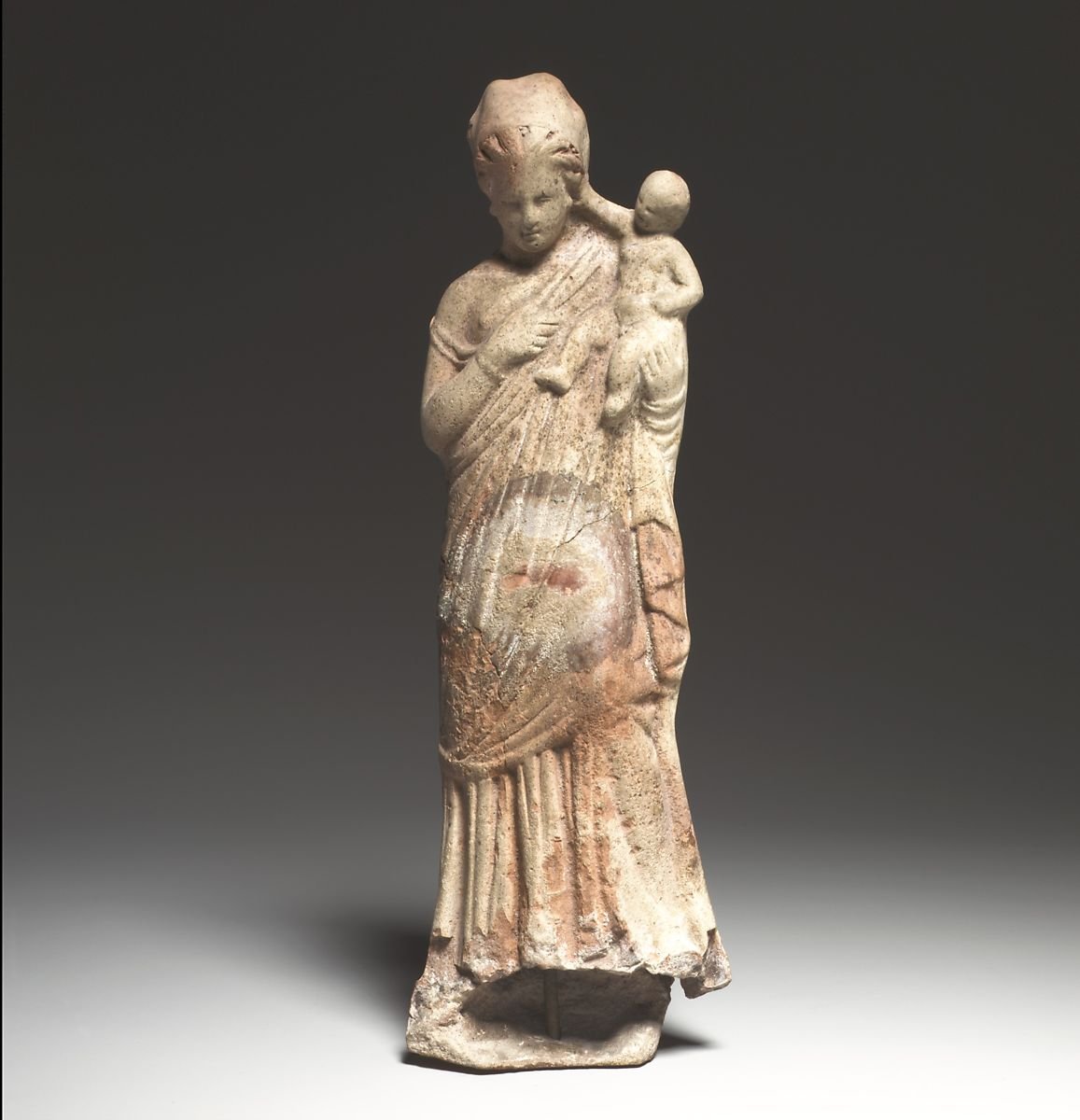 4/nTitle: Terracotta statuette of a woman holding a babyPeriod: Late HellenisticDate: 2nd–1st century B.C.Culture: Greek, Asia Minor, Myrina (?)Medium: Terracotta; mold-madeDimensions: H. 8 7/16 in. (21.4 cm)Accession Number: 74.51.1729 https://www.metmuseum.org/art/collection/search/130001750?rpp=60&pg=2&ao=on&ft=%2A&deptids=13&where=Greece&pos=78 #Archaeology