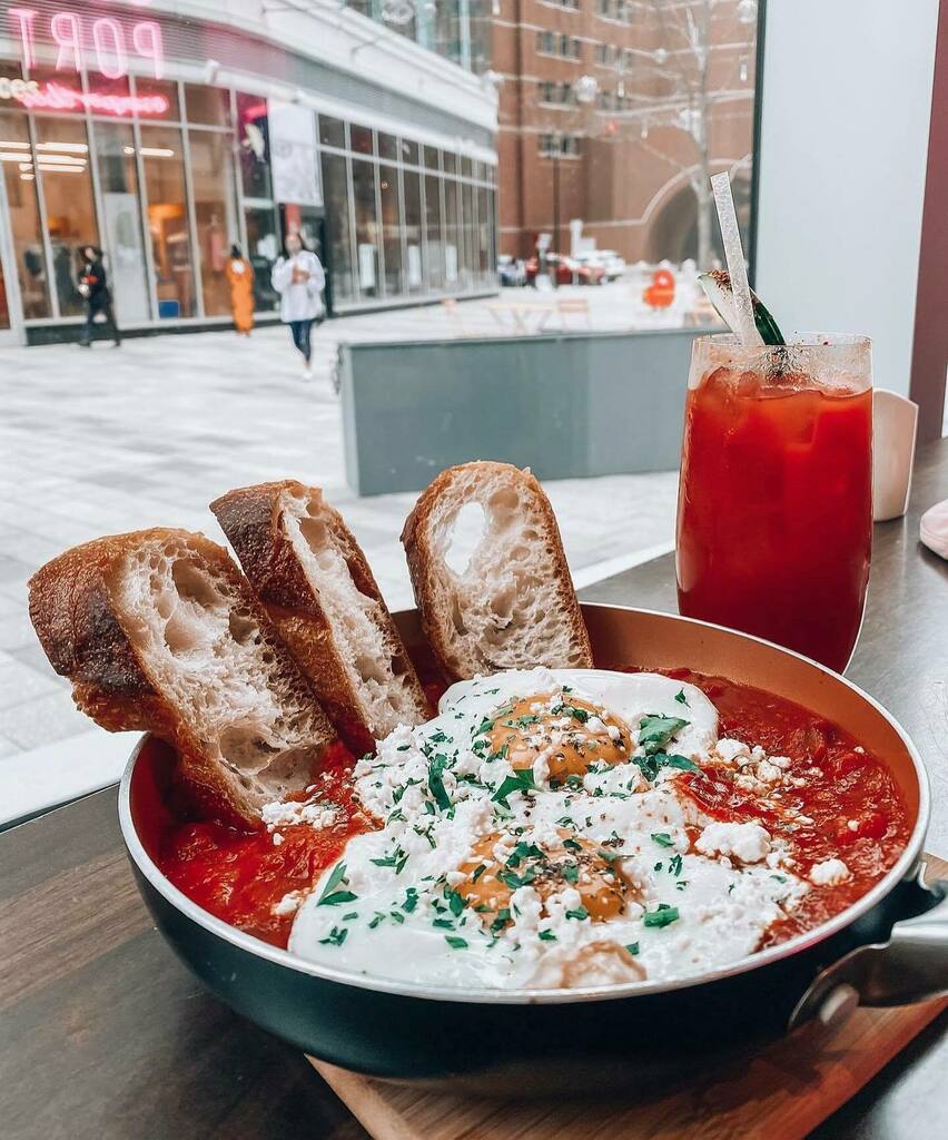 ParisSeaport's tweet photo. Brunch, lunch or late night—shakshuka is one of our go-to dishes. It’s light—yet nourishing—and packed with flavor! Whether your digging in after a walk around the seaport, after a good workout or while taking your dog for a stroll—we’ve got you. Pair with one of our new mar… https://t.co/yR1eG3DZl9