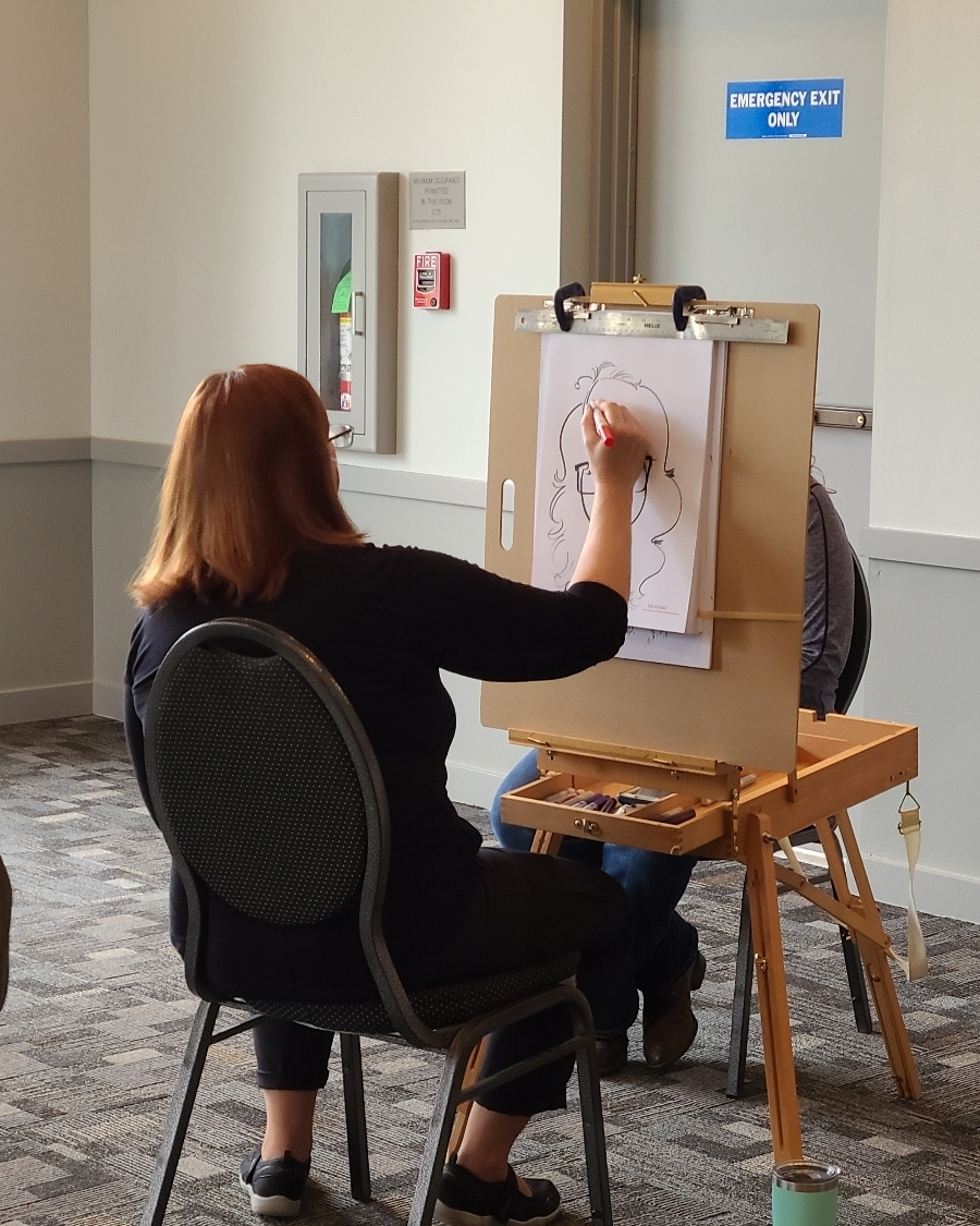 ..
In real time at our INTIMATE BRIDAL SHOW!! We have portrait sketches going on! come stop in &amp; have one created of yourself... &amp; check out all our vendors while you're here!
