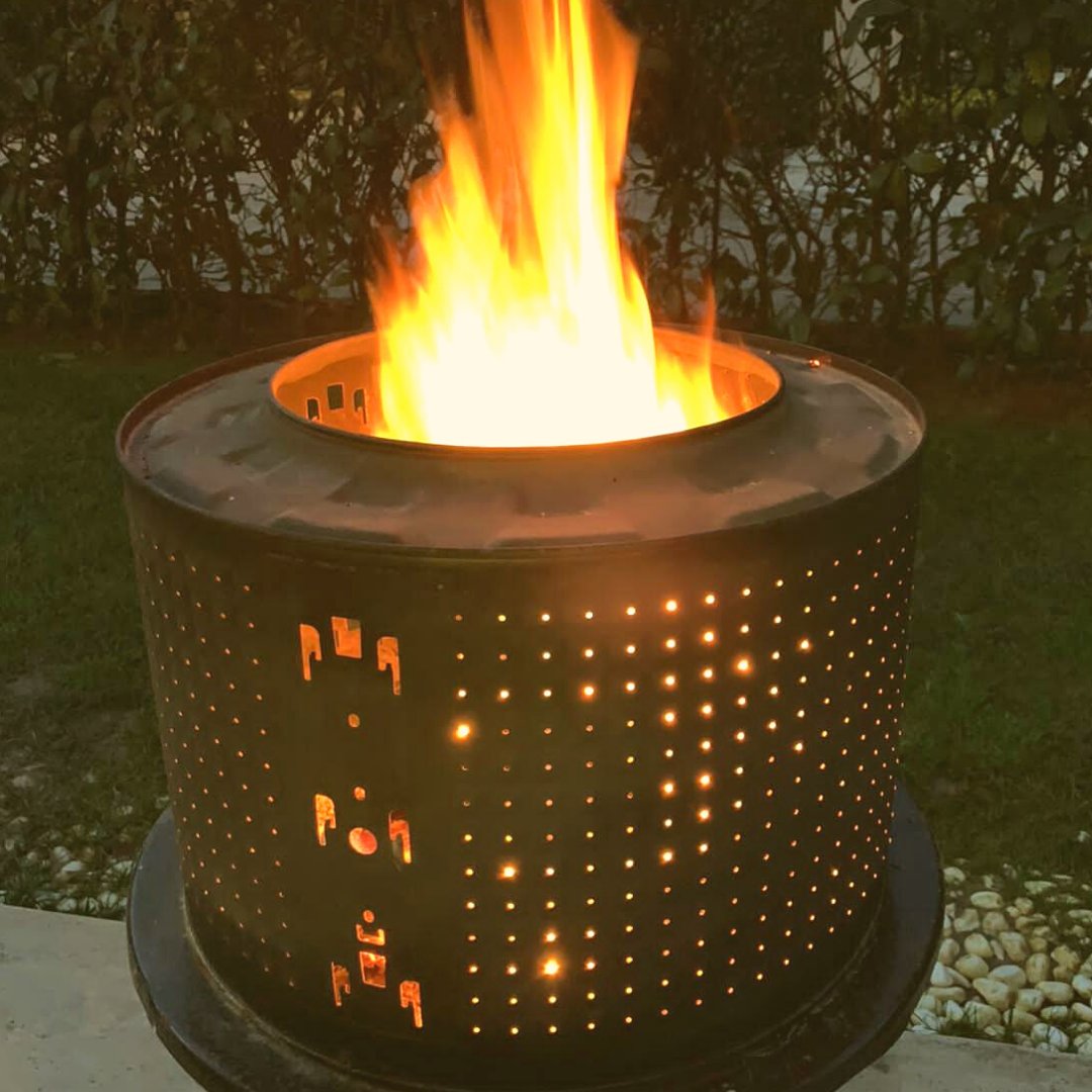 A friend made this fire pit using an old washing machine drum! #DAinspired