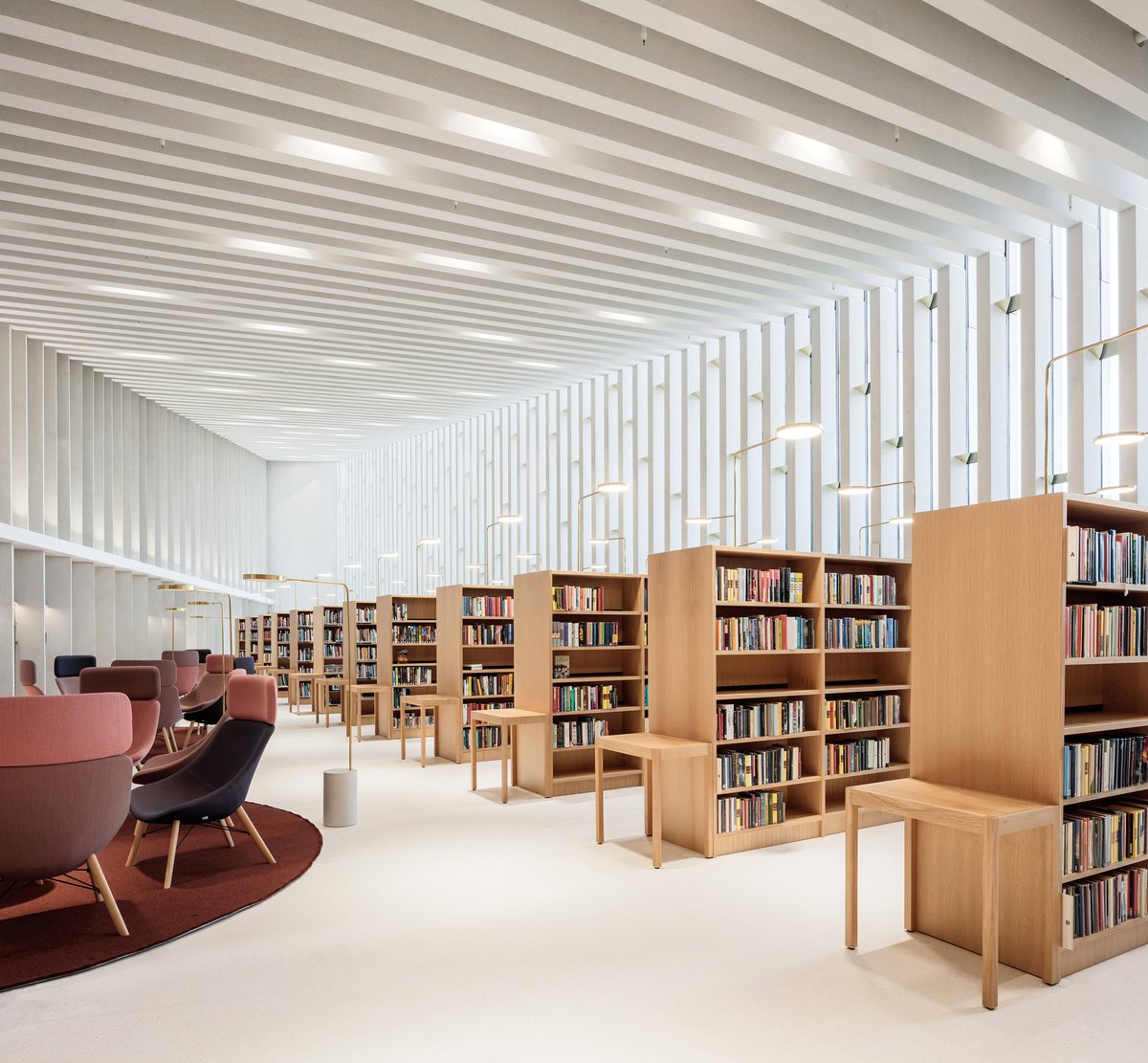 .<a href="/JKMMArchitects/">JKMM Architects</a> has renovated and extended a 1980s library in Finland: at.dezeen.com/3dbMzKi