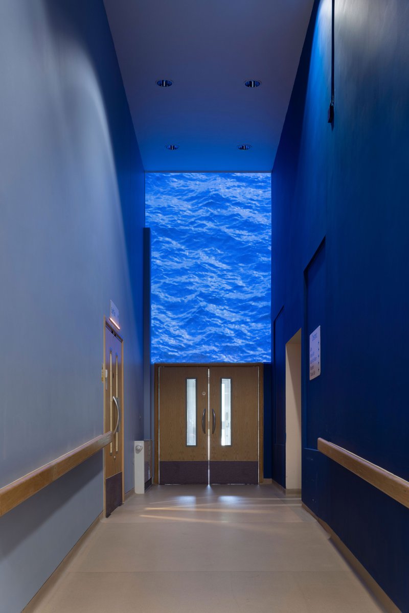 SaoltaArts's tweet photo. Hellingly Centre, Sussex. Artist Sophie Clements projected film onto the main corridor entrance ‘When the clouds clear’. Photos: Damien Griffiths. Our closing exhibition #TheDeepestShadeofGreen for @galway2020
#galway2020 #gaillimh2020 #LetTheMagicIn #artsandhealth https://t.co/eVfJ1bW9vJ