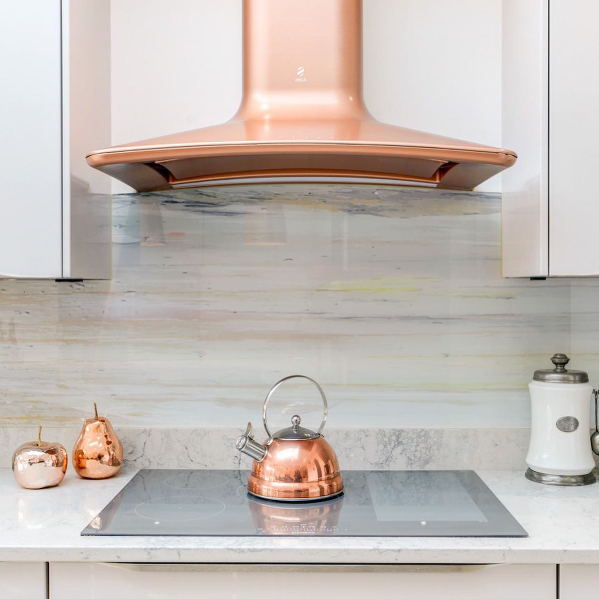 Calming pastel tones are always required on a Monday to ease us back into the week. 🤩 We love our glass panel installed by us into a kitchen designed and installed by the fabulous @SussexAlexander 👏 #copperkitchen #pastelsplashback #printedglass #glasssplashback #kitcheninspo