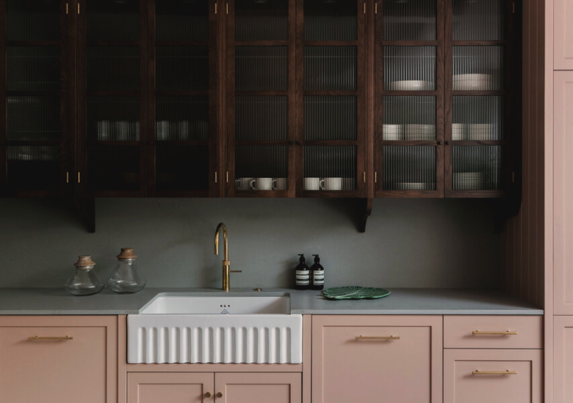 I don't often see a kitchen I love but I've been quite preoccupied with this <a href="/StudioDuggan/">Studio Duggan</a>-designed one since I saw it in this month's <a href="/_houseandgarden/">House & Garden Magazine</a>. The plaster pink mixed with dark-stained cabinetry with fluted glass is lovely