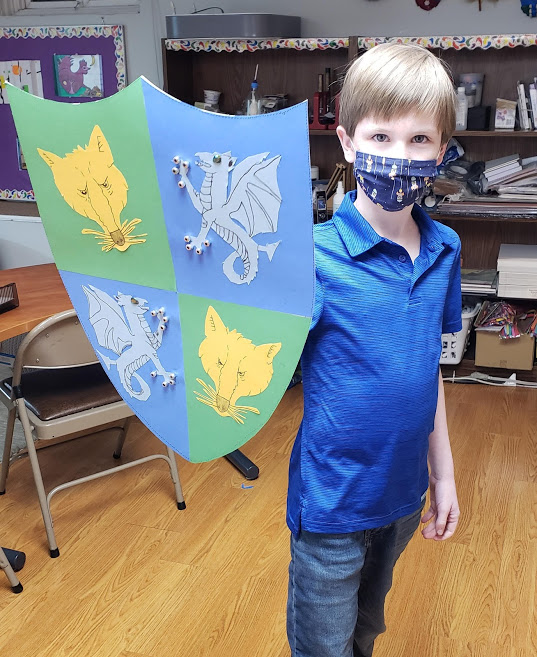 Andi_Stix's tweet photo. During our study of #MedievalTimes, our fourth-year Time Travelers students studied the art of heraldry and designed a shield with emblems/charges that reflect their personality. #GtecKids https://t.co/kqT81dC6ab