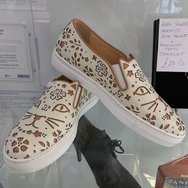 CRUKWimVil's tweet photo. We have had some very generous donations today. Why not come and check them out. Included are a pair of Hermes boots and some very funky Charlotte Olympia cat trainers. @CRUKShops @CR_UK #hermes #charlotteolympia #trainers #boots #charityshopping https://t.co/JwU7tjEayd
