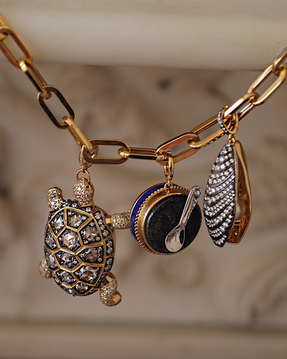 The best of friends. Charms handcrafted in 18ct Gold adorned with diamonds and other precious gemstones. Discover more: bit.ly/3dxq2rC 

#charms #goldcharms #annoushkaqueenofcharms #sloanesquare #yellowgold #diamonds #diamond #spring #springstyle #neckmess #leaveyourmark
